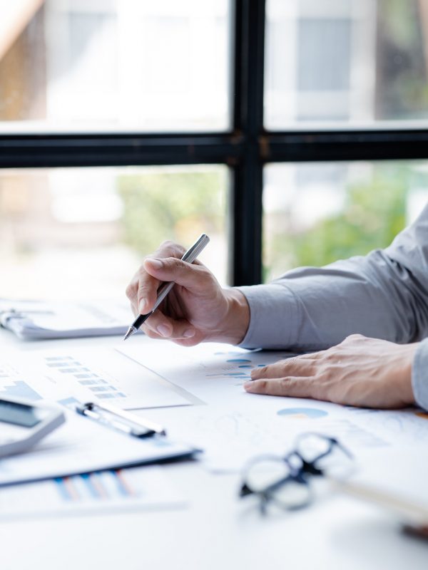 a-female-financier-is-reviewing-company-financial-documents-.jpg